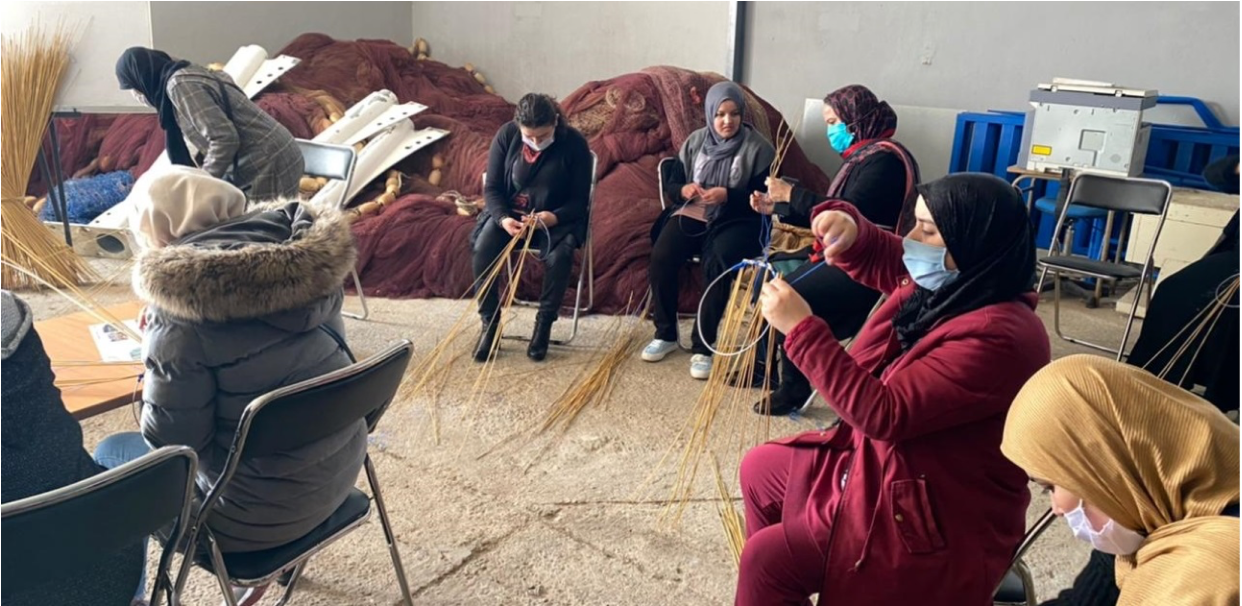 Photo: Fisherwomen building traditional fishing gear, Al Hoceima, Morocco.